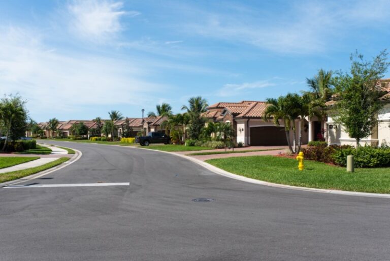 American suburban street lined with tile-roofed single-family homes